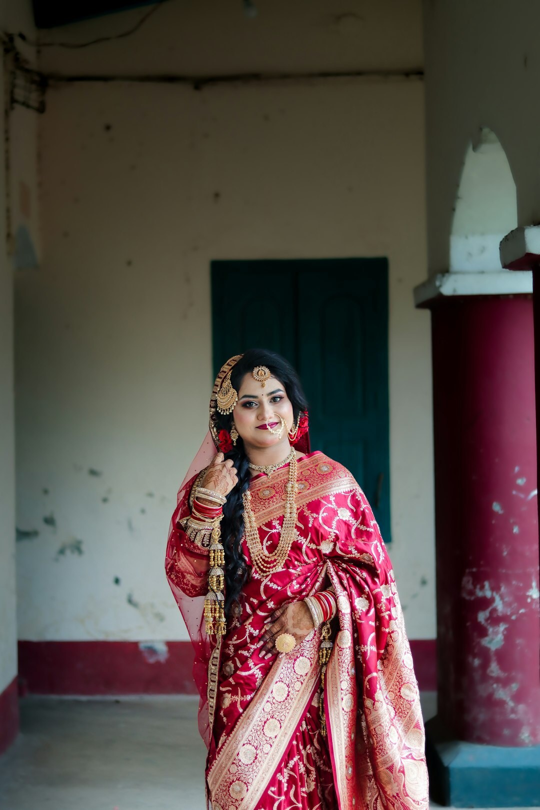 Studio portrait of a South Asian British woman with long dark hair